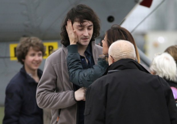 French journalist Edouard Elias is welcomed by relatives after being freed from captivity in Syria French journalist Edouard Elias is welcomed by relatives after being freed from captivity in Syria