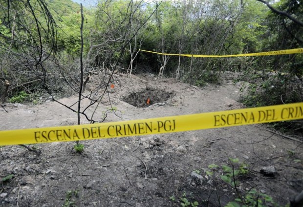 One of the mass graves discovered near Iguala on October 6, 2014 One of the mass graves discovered near Iguala on October 6, 2014