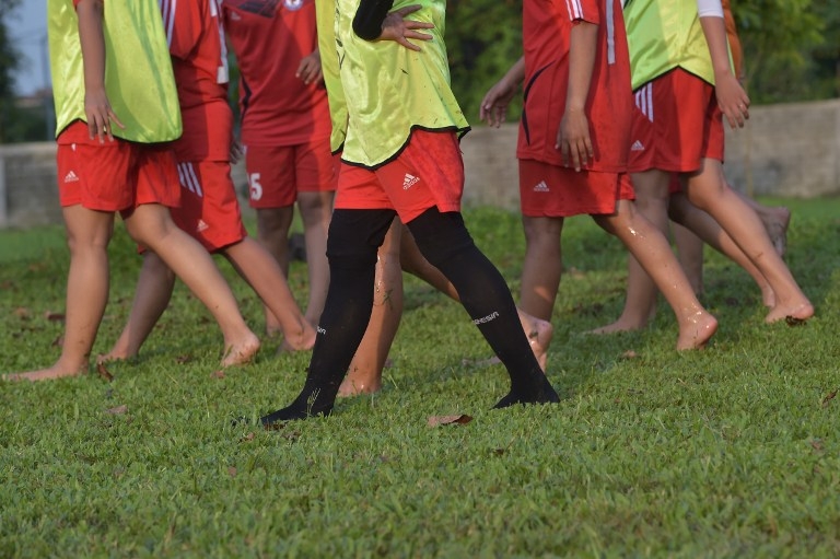 Members of the CSC football club at a training session in Jakarta on March 26, 2015 Members of the CSC football club at a training session in Jakarta on March 26, 2015