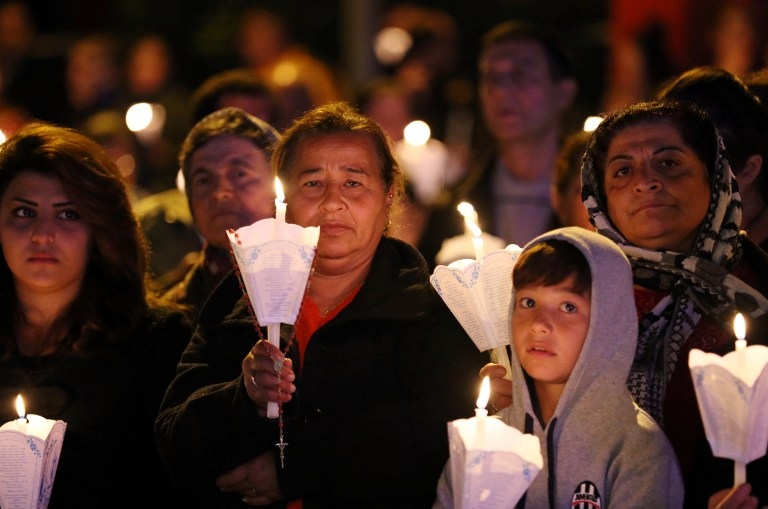 Displaced Iraqi Christians celebrate a traditional ceremony in Arbil on December 6, 2014 Displaced Iraqi Christians celebrate a traditional ceremony in Arbil on December 6, 2014