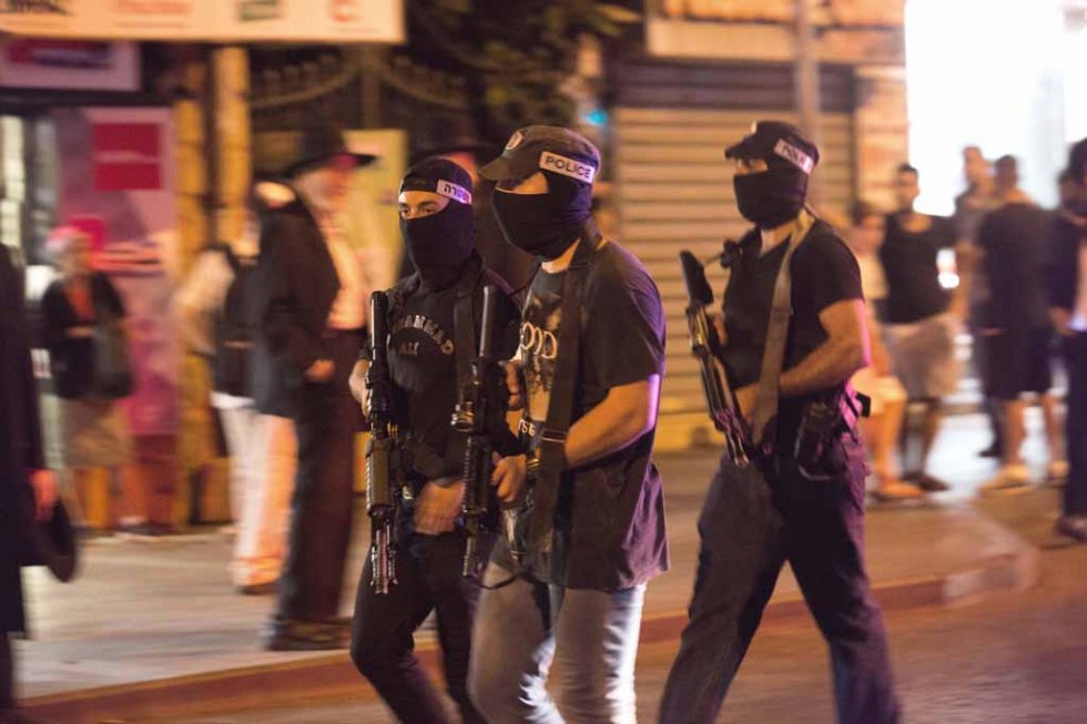 Israeli police search the site following a stabbing near the central bus station in Jerusalem. Israeli police search the site following a stabbing near the central bus station in Jerusalem.