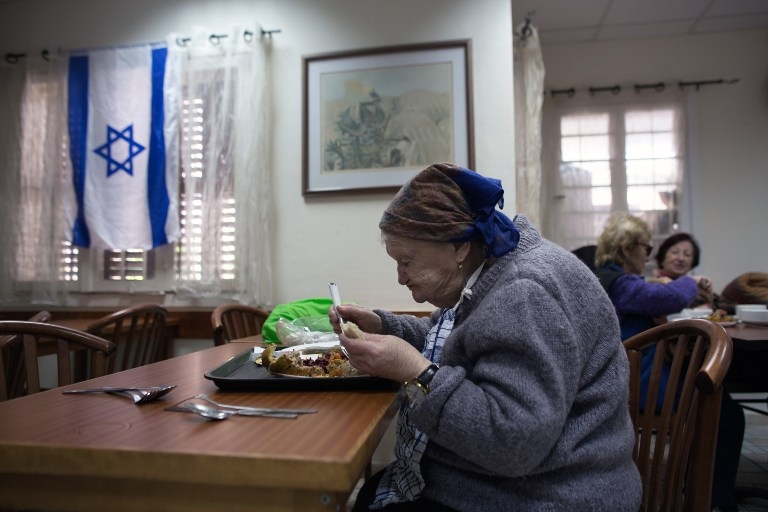 In the shared dining room on Haifa's 'Survivors' Street', on January 21, 2015 In the shared dining room on Haifa's 'Survivors' Street', on January 21, 2015