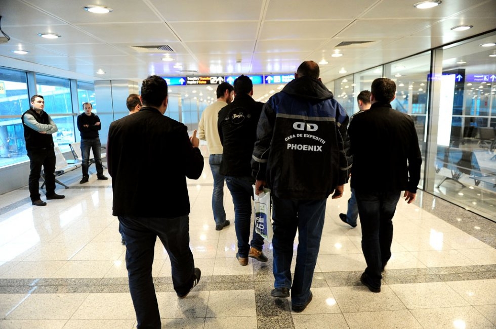 Plainclothes Turkish police officers detain a passenger at an Istanbul airport, January, 2015. Plainclothes Turkish police officers detain a passenger at an Istanbul airport, January, 2015.