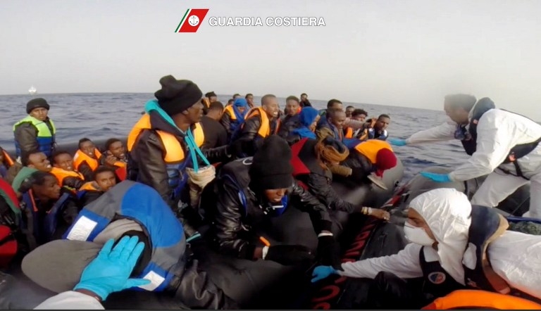 The Italian Coast Guard rescuing shipwrecked migrants on April 20, off the coast of Sicily The Italian Coast Guard rescuing shipwrecked migrants on April 20, off the coast of Sicily
