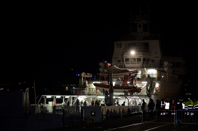 Migrants rescued off the Libyan coast arrive at the harbor in Catania, Italy on April 20, 2015 Migrants rescued off the Libyan coast arrive at the harbor in Catania, Italy on April 20, 2015