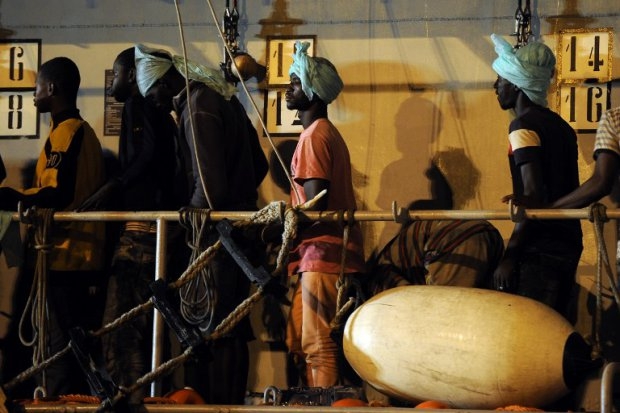 Migrants disembark from the Italian military ship 'Grecale' in the port of Pozzallo, Sicily, on July 2, 2014 two days after a rescue operation at sea (AFP PHOTO / GIOVANNI ISOLINO) Migrants disembark from the Italian military ship 'Grecale' in the port of Pozzallo, Sicily, on July 2, 2014 two days after a rescue operation at sea (AFP PHOTO / GIOVANNI ISOLINO)