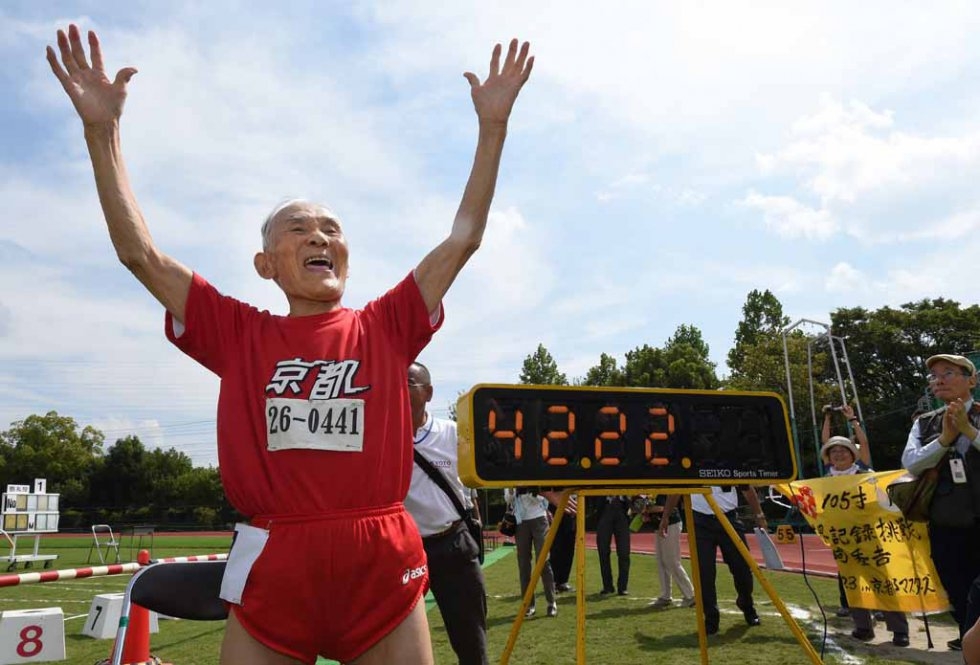 Hidekichi Miyzaki celebrates after setting his world record. Hidekichi Miyzaki celebrates after setting his world record.