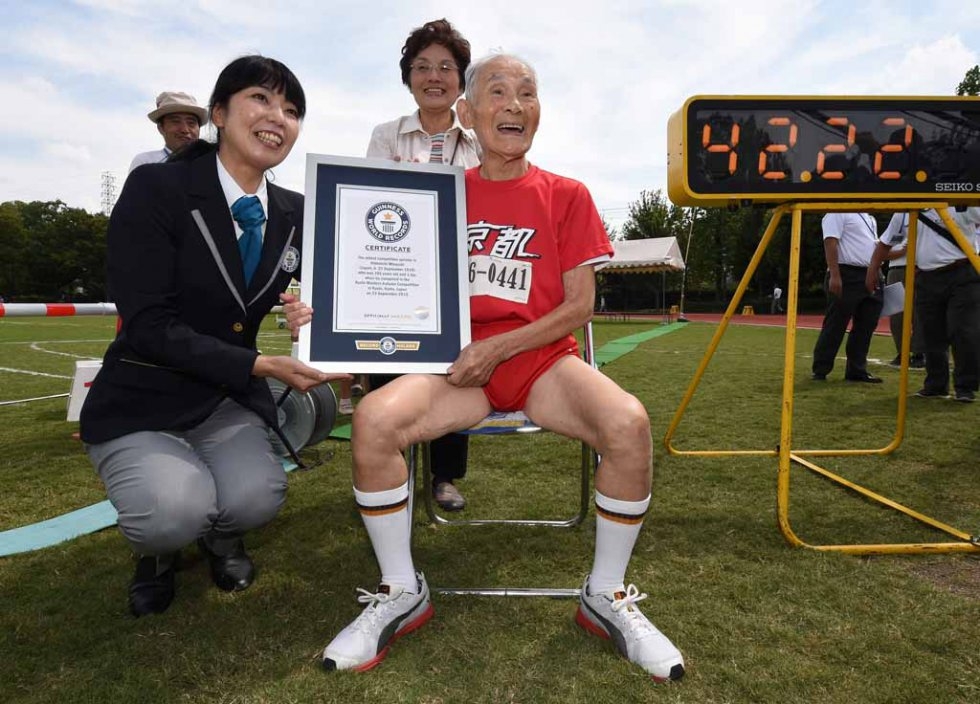 Hidekichi Miyzaki holds his certificate from Guinness World Records after setting his record in 100 metres in the over-105 age category. Hidekichi Miyzaki holds his certificate from Guinness World Records after setting his record in 100 metres in the over-105 age category.