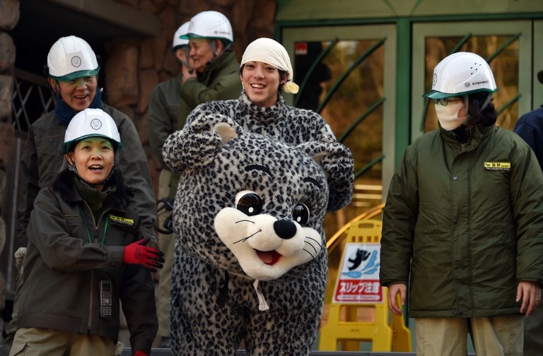 The 'leopard' reveals his identity after the Tama zoo escape drill on February 10, 2015 The 'leopard' reveals his identity after the Tama zoo escape drill on February 10, 2015
