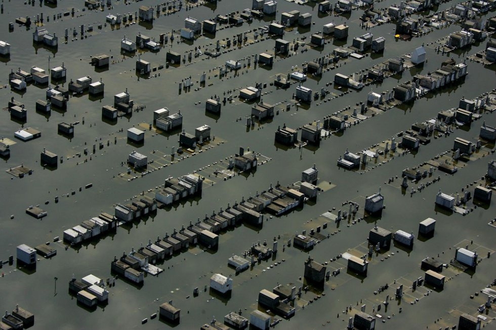 Flood waters from Hurricane Katrina cover a cementery on August 30, 2005 in New Orleans Flood waters from Hurricane Katrina cover a cementery on August 30, 2005 in New Orleans