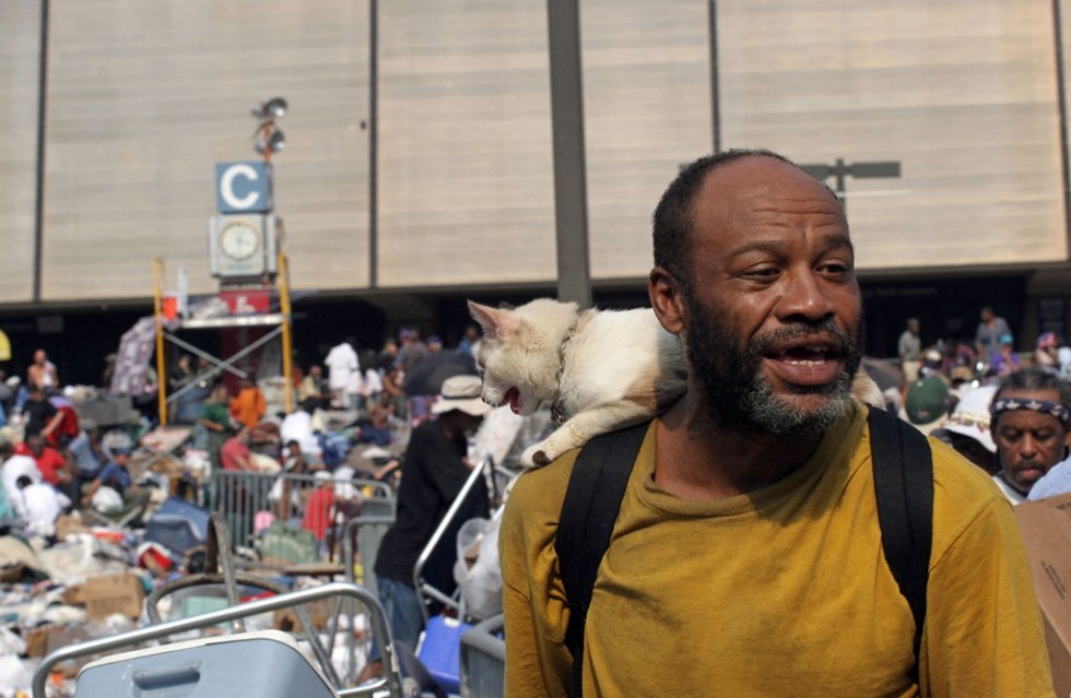 John Barnes, 50, and his cat Patches wait to be evacuated from the Superdome in New Orleans on September 3, 2005 John Barnes, 50, and his cat Patches wait to be evacuated from the Superdome in New Orleans on September 3, 2005