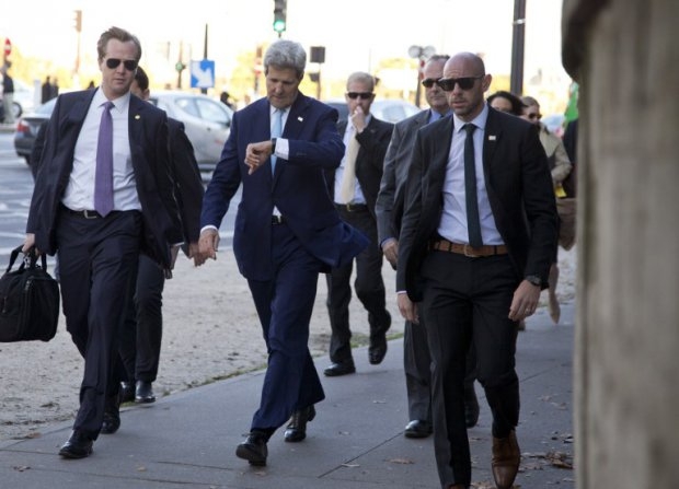 Kerry walks in downtown Paris with staff and security on October 13, 2014 Kerry walks in downtown Paris with staff and security on October 13, 2014