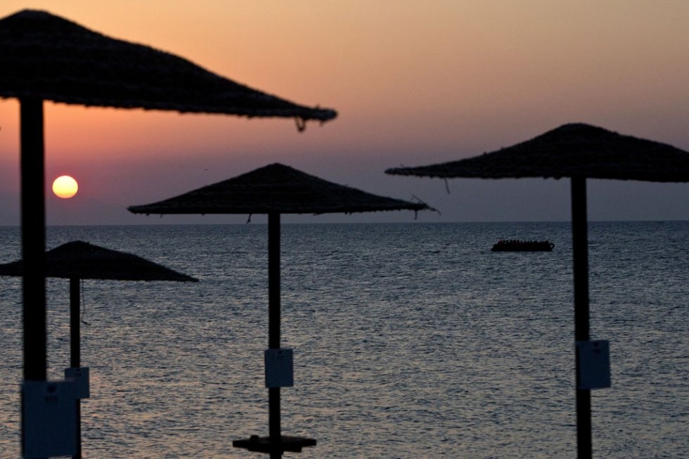 A dinghy carrying migrants crosses the Aegean sea between Turkey and Greece off the island of Kos on August 13, 2015 A dinghy carrying migrants crosses the Aegean sea between Turkey and Greece off the island of Kos on August 13, 2015