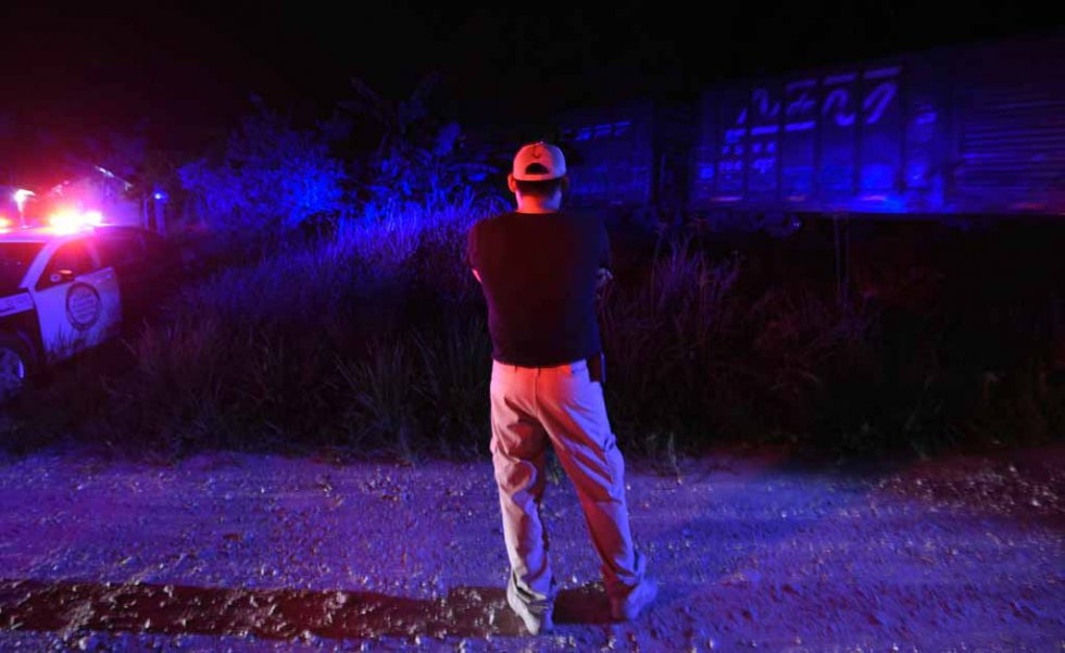An agent of the Mexican Immigration Service during an operation in San Mateo, Chiapas State on June 20, 2015 An agent of the Mexican Immigration Service during an operation in San Mateo, Chiapas State on June 20, 2015