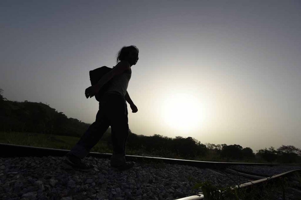 A migrant walks in Chacamax, Chiapas state, Mexico, on June 21, 2015 A migrant walks in Chacamax, Chiapas state, Mexico, on June 21, 2015