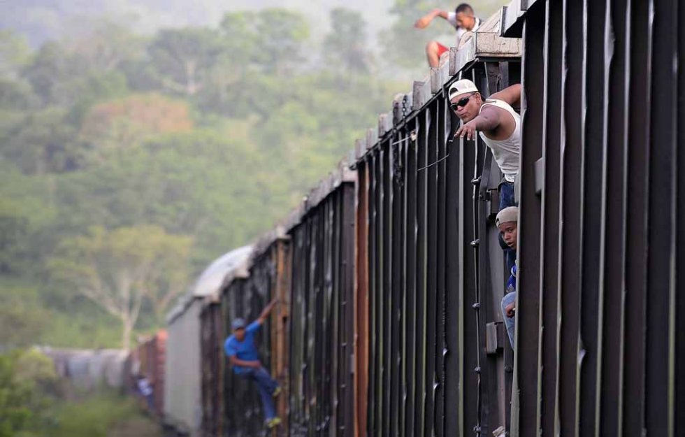 Migrants on board a train in Chacamax, Chiapas State on June 21, 2015 Migrants on board a train in Chacamax, Chiapas State on June 21, 2015