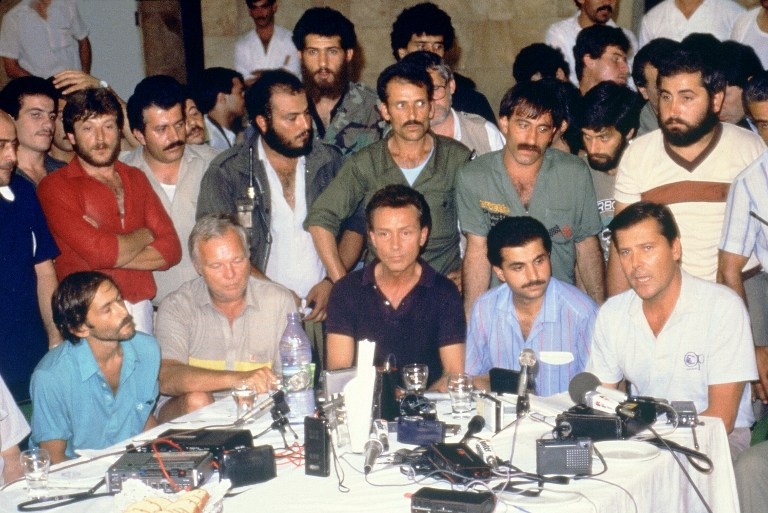 US hostages are presented to the press by their captors on June 20, 1985 at Beirut airport US hostages are presented to the press by their captors on June 20, 1985 at Beirut airport