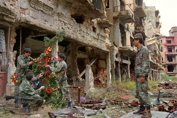 Muslim soldiers of the Lebanese Army set up a Christmas tree on the Green Line dividing Muslim west and Maronite Christian east Beirut, on December 23, 1987 Muslim soldiers of the Lebanese Army set up a Christmas tree on the Green Line dividing Muslim west and Maronite Christian east Beirut, on December 23, 1987