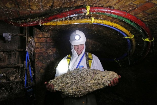 "Flusher" Tim Henderson holds a "fatberg", at the intersection of the Regent Street and Victoria sewers "Flusher" Tim Henderson holds a "fatberg", at the intersection of the Regent Street and Victoria sewers