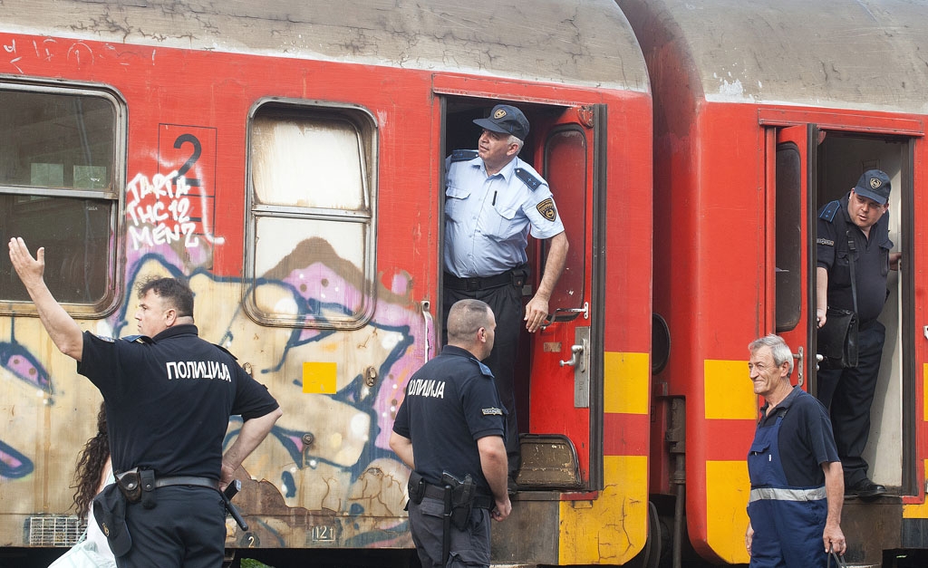 Police check for migrants on a train June 10, 2015 in Demir Kapija Police check for migrants on a train June 10, 2015 in Demir Kapija