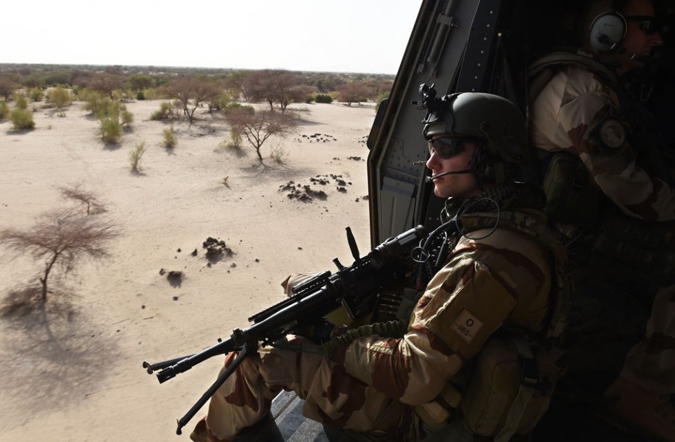 A French soldier overflies the desert on June 1, 2015 near Gao in northern Mali A French soldier overflies the desert on June 1, 2015 near Gao in northern Mali