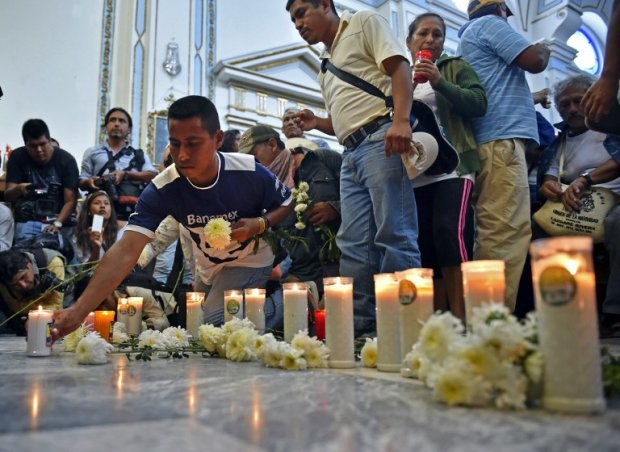 Relatives and mates of the 43 missing students take part in a mass at the Cathedral in Chilpancingo, Guerrero state on October 14, 2014 (AFP Photo / Yuri Cortez) Relatives and mates of the 43 missing students take part in a mass at the Cathedral in Chilpancingo, Guerrero state on October 14, 2014 (AFP Photo / Yuri Cortez)