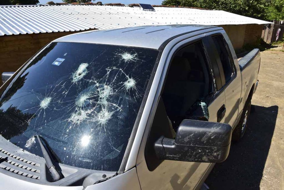 A truck damaged by gunfire at the El Aguila ranch. A truck damaged by gunfire at the El Aguila ranch.
