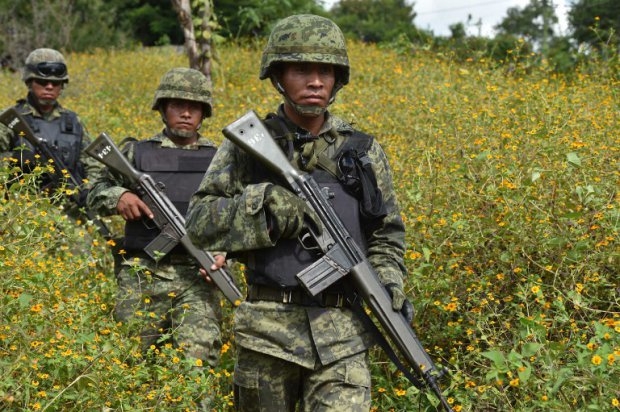Mexican Marines patrol the mountains around Iguala on October 1st, 2014 (AFP Photo / Yuri Cortez) Mexican Marines patrol the mountains around Iguala on October 1st, 2014 (AFP Photo / Yuri Cortez)