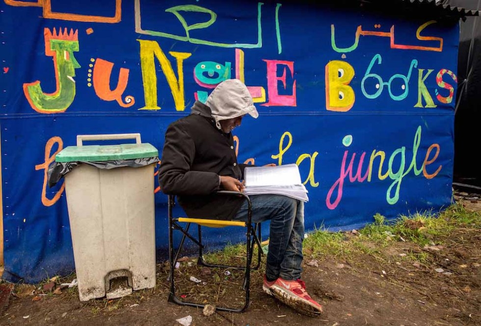 The Jungle's makeshift library. October, 2015. The Jungle's makeshift library. October, 2015.