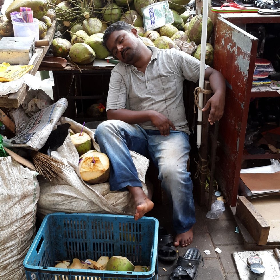 "I had stepped down the road from our office to have a cup of tea when I saw the guy enjoying a siesta….. He was awakened by a fellow shopkeeper as I started to shoot so I walked away. But I sensed that he would doze off again. I came back 5 minutes lat "I had stepped down the road from our office to have a cup of tea when I saw the guy enjoying a siesta….. He was awakened by a fellow shopkeeper as I started to shoot so I walked away. But I sensed that he would doze off again. I came back 5 minutes lat