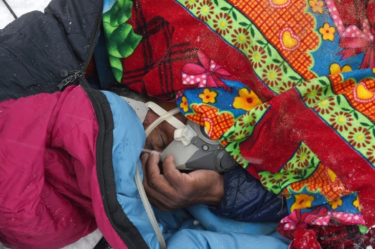 Banja, a porter working for a trekking company, recovers after he was injured by snow and debris from an avalanche at Everest Base Camp on April 25, 2015 Banja, a porter working for a trekking company, recovers after he was injured by snow and debris from an avalanche at Everest Base Camp on April 25, 2015