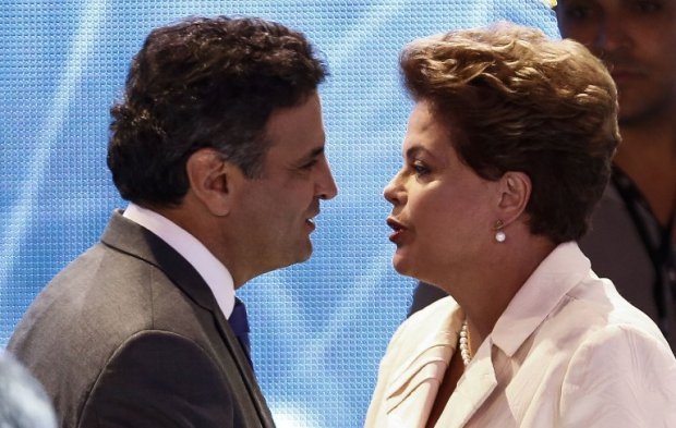 Dilma Rousseff and Aecio Neves greet before a TV debate in Sao Paulo on August 26, 2014 Dilma Rousseff and Aecio Neves greet before a TV debate in Sao Paulo on August 26, 2014