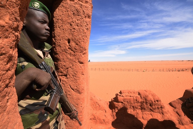 A Niger soldier stands guard in Madama, Niger on January 1, 2015 A Niger soldier stands guard in Madama, Niger on January 1, 2015