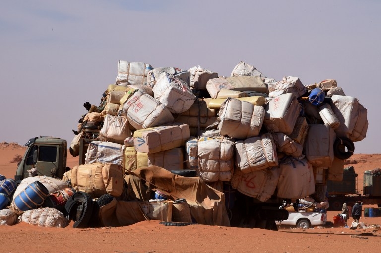A fully loaded truck at Madama, Niger on January 1, 2015 A fully loaded truck at Madama, Niger on January 1, 2015