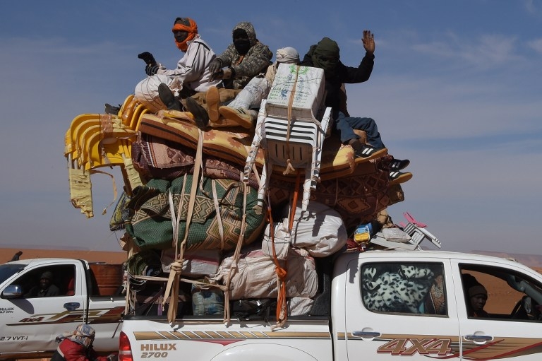 A pick-up truck laden with goods in Madama, Niger, on January 1, 2015 A pick-up truck laden with goods in Madama, Niger, on January 1, 2015
