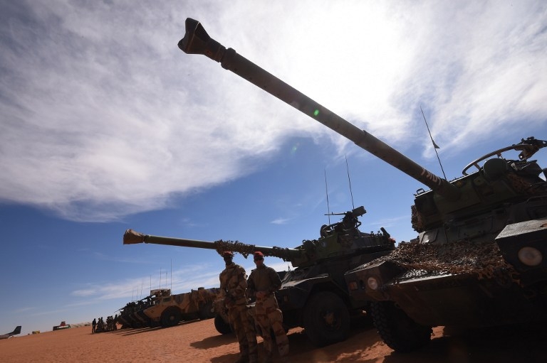 French soldiers in front of armoured vehicles in Madama, Niger on January 1, 2015 French soldiers in front of armoured vehicles in Madama, Niger on January 1, 2015