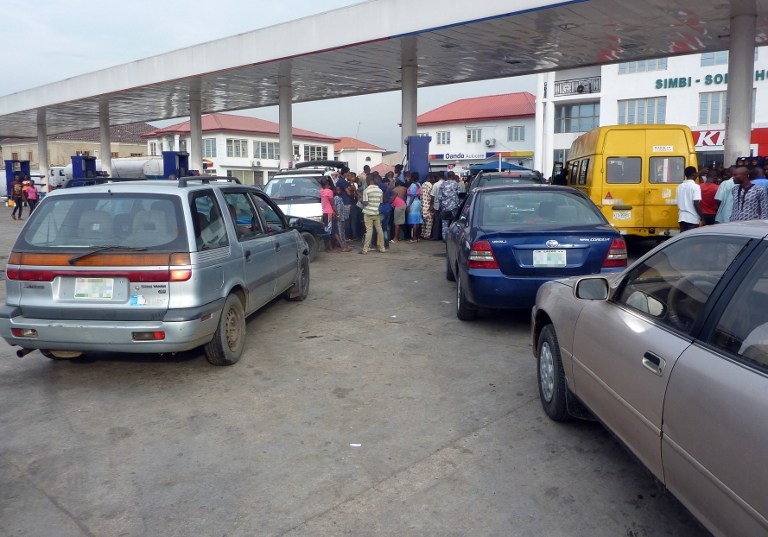 Vehicles queue at a filling station in Lagos during a fuel shortage on March 1, 2014 Vehicles queue at a filling station in Lagos during a fuel shortage on March 1, 2014