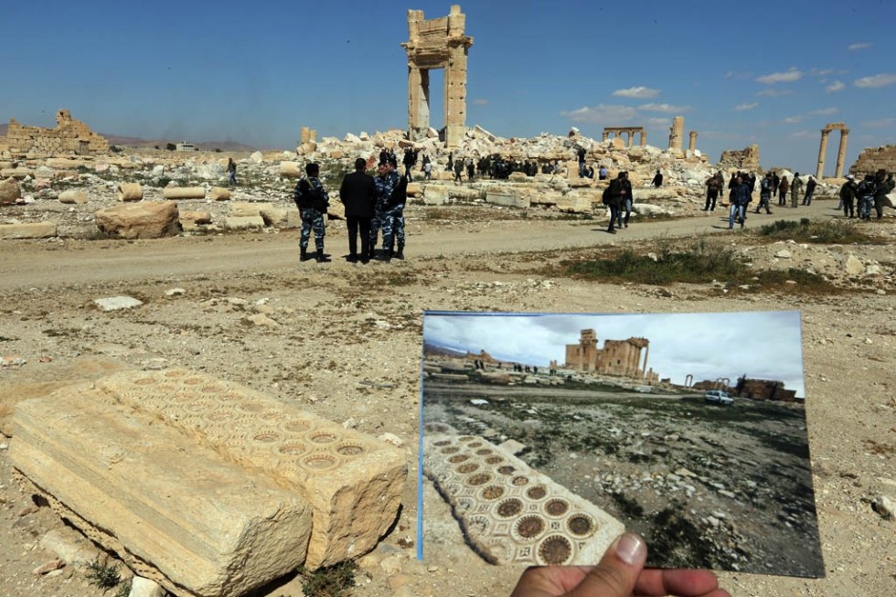 The Temple of Bel as it was on March 14, 2014, and the remains of the monument destroyed by the Islamic State group The Temple of Bel as it was on March 14, 2014, and the remains of the monument destroyed by the Islamic State group