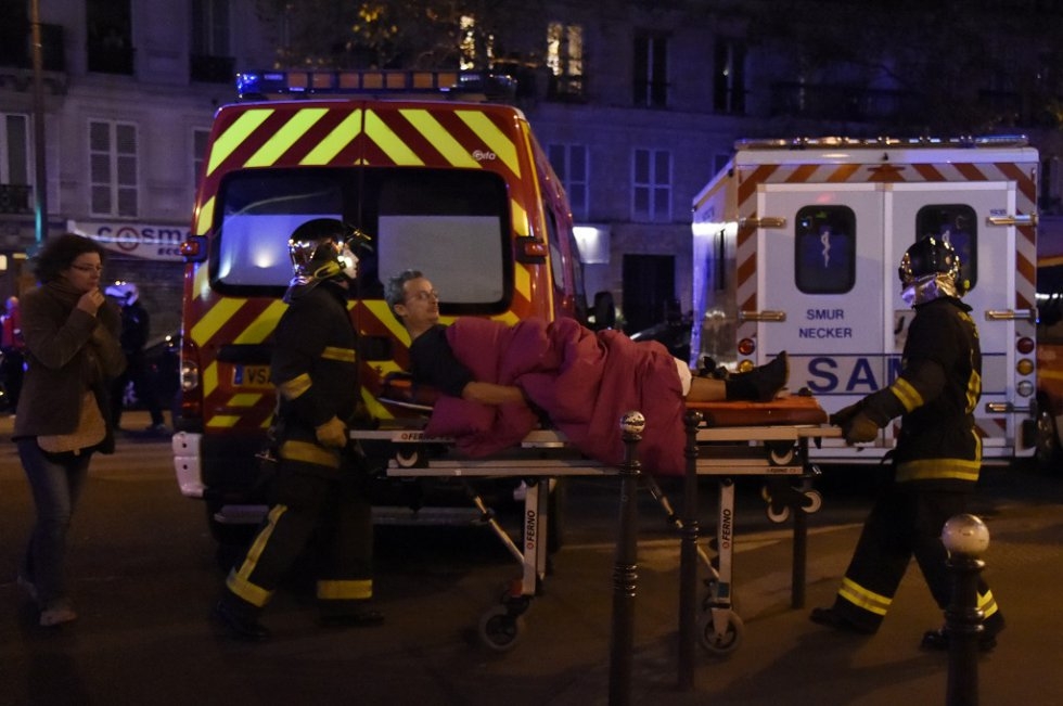 A victim of the November 13 attacks in Paris is carried on a stretcher. A victim of the November 13 attacks in Paris is carried on a stretcher.