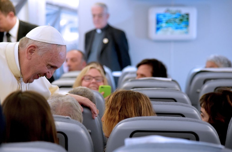 Pope Francis welcomes the journalists on board a flight to Ecuador on July 5, 2015 Pope Francis welcomes the journalists on board a flight to Ecuador on July 5, 2015