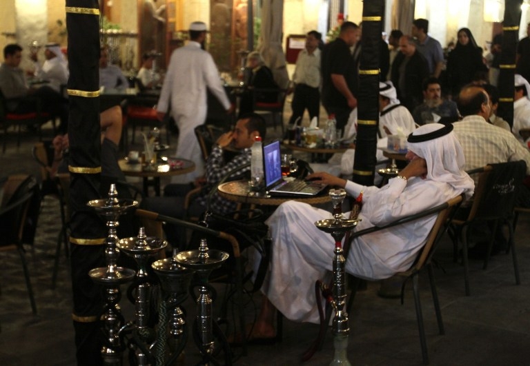 A Qatari man works on his laptop at the Souq Waqif market in the old city of Doha in March 2010 A Qatari man works on his laptop at the Souq Waqif market in the old city of Doha in March 2010