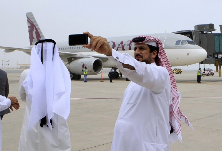 Qataris take pictures at Doha's new Hamad International Airport Qataris take pictures at Doha's new Hamad International Airport