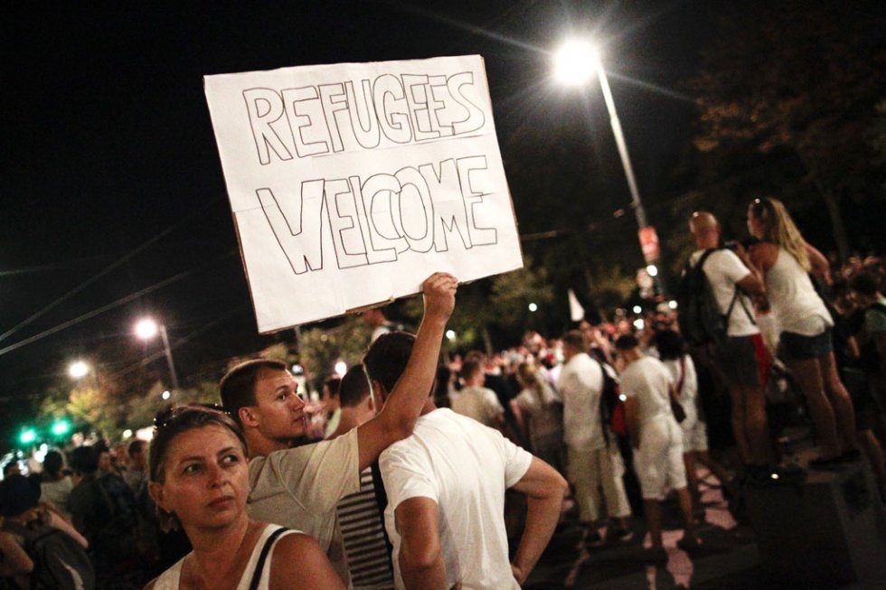 Austrians rally against ill-treatment of migrants in Vienna on August 31, 2015, after the bodies of 71 refugees were found in an abandoned truck near the city Austrians rally against ill-treatment of migrants in Vienna on August 31, 2015, after the bodies of 71 refugees were found in an abandoned truck near the city
