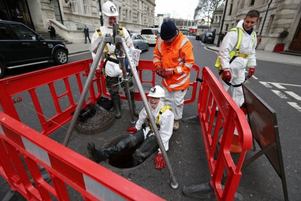 AFP reporter Helen Percival emerges from Regent sewer in London AFP reporter Helen Percival emerges from Regent sewer in London