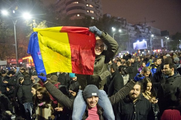 People celebrate Iohannis' victory in downtown Bucharest on November 16, 2014 People celebrate Iohannis' victory in downtown Bucharest on November 16, 2014