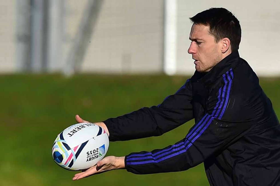All Blacks fullback Ben Smith passes a ball during training. All Blacks fullback Ben Smith passes a ball during training.