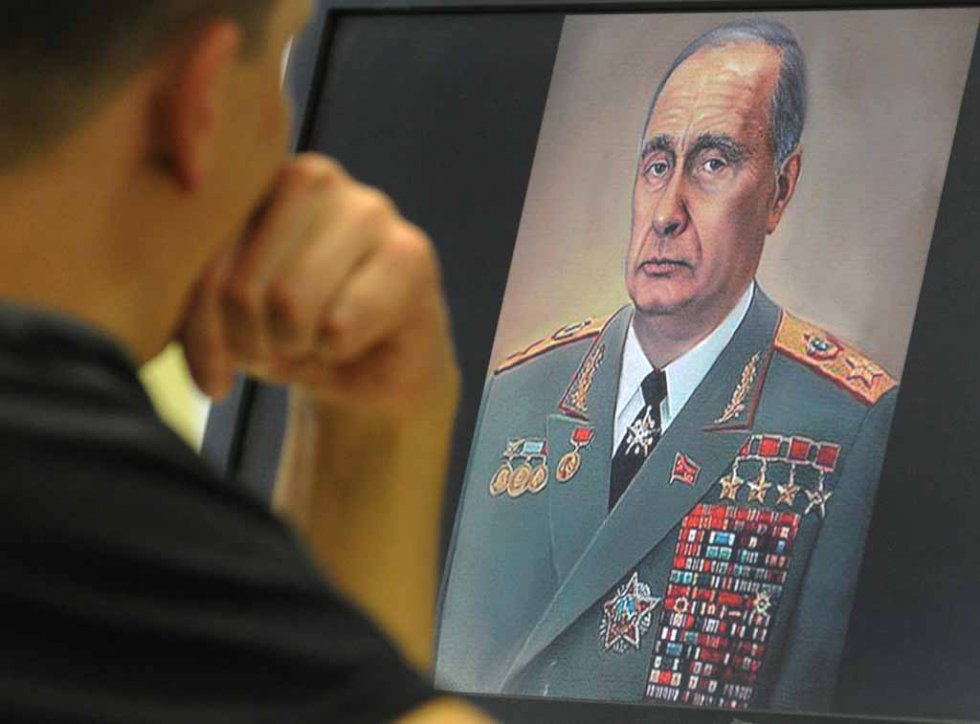 Vladimir Putin is presented as Soviet leader Leonid Brezhnev in a caricature. Vladimir Putin is presented as Soviet leader Leonid Brezhnev in a caricature.
