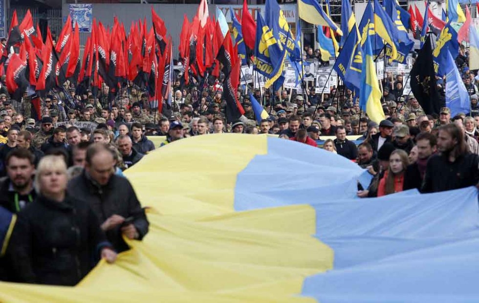 Nationalist party supporters march in Kiev in October. Nationalist party supporters march in Kiev in October.