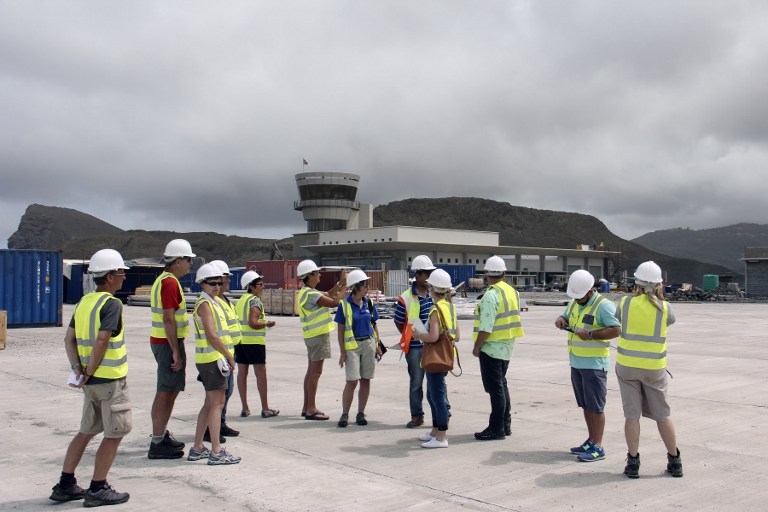 Tourists visit the site of Saint Helena's future airport in March 2015 Tourists visit the site of Saint Helena's future airport in March 2015