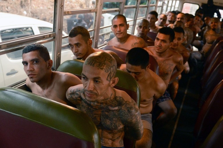 Gang members are transferred by bus to a high-security prison in Izalco, El Salvador on April 24, 2015 Gang members are transferred by bus to a high-security prison in Izalco, El Salvador on April 24, 2015